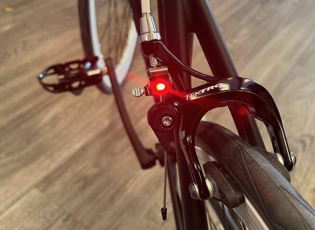 Caliper Brakes of a Road Bicycle, with brake light